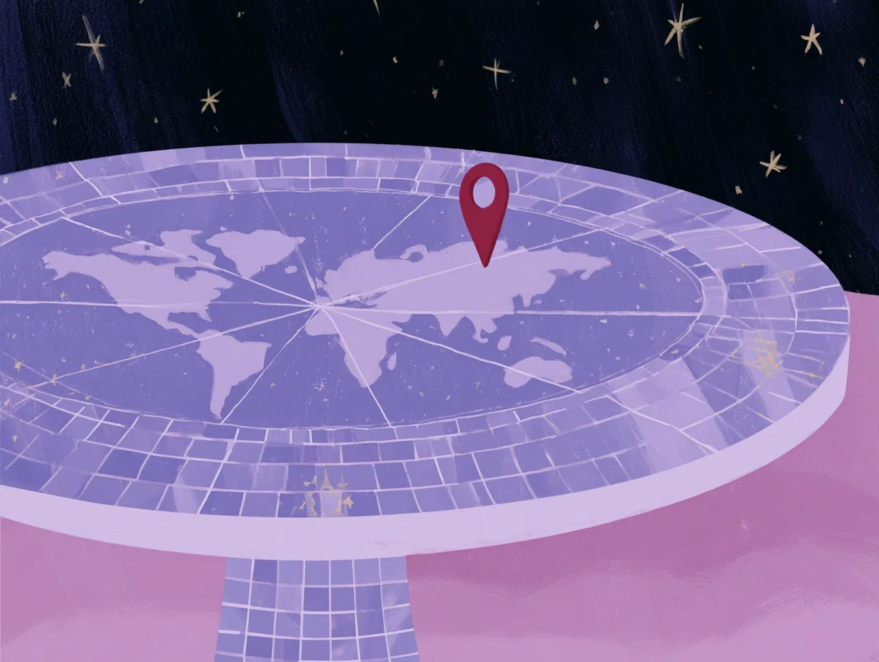 Mesa circular lila con un mapamundi encima y una chincheta clavada, sobre un cielo estrellado